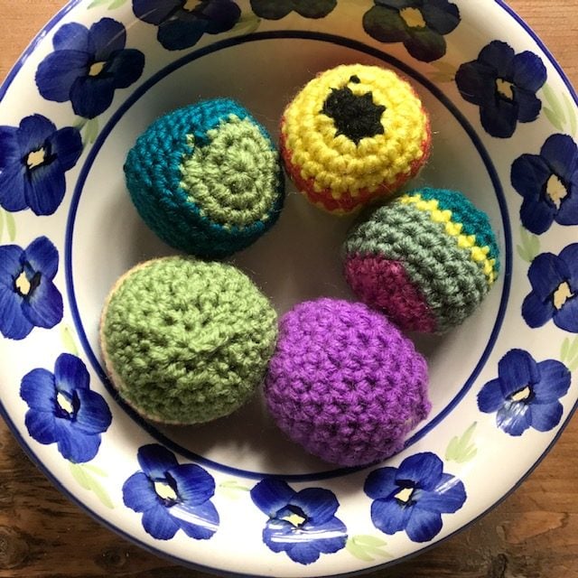 crochet hacky sacks in bowl rotated