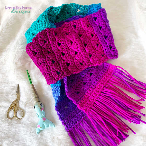 Quick Spring Sweet Stripes Skinny Scarf Crochet Pattern shown in bright pink, purple and teal variagated yarn