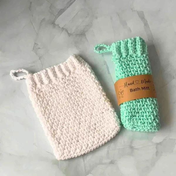 Two crocheted bath mitts displayed. Bath Mitt and Washcloth Crochet Pattern for Beginners by Start Crochet