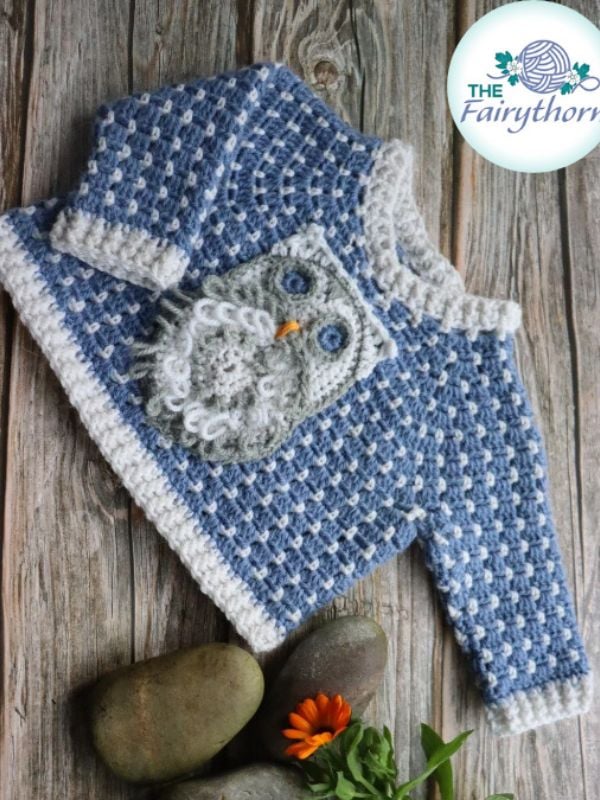 Crochet sweater with owl pocket design. Free kids crochet sweater pattern Snowy Owl pocket pullover by Fairythorne