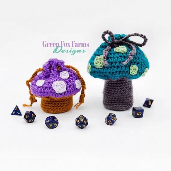 Colorful crochet mushrooms with dice. Mini Mushroom Drawstring Pouch Free Crochet Pattern