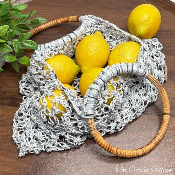 Crocheted bag with lemons inside. Solomons Knot Market Bag Free Pattern The Crochet Village
