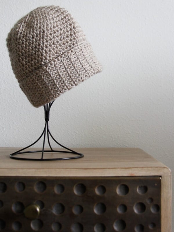 Crocheted beige hat on display stand. Spider Stitch Brimmed Hat by Salty Pearl Crochet
